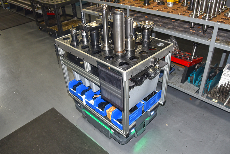 TED A to Z Machines autonomous robot carrying parts from one station to another