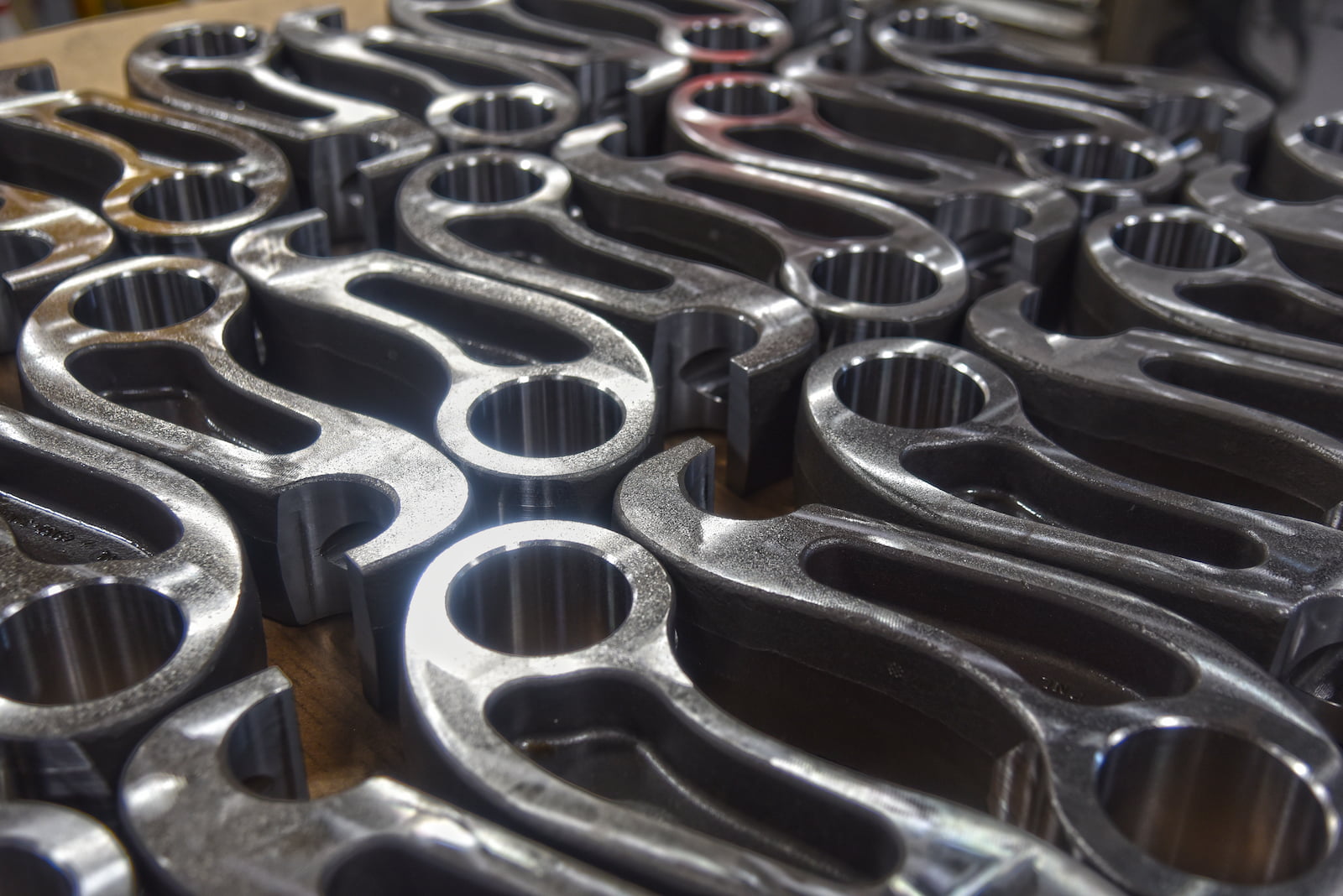 Precision-machined steel components in production at A to Z Machine CNC shop in Appleton.