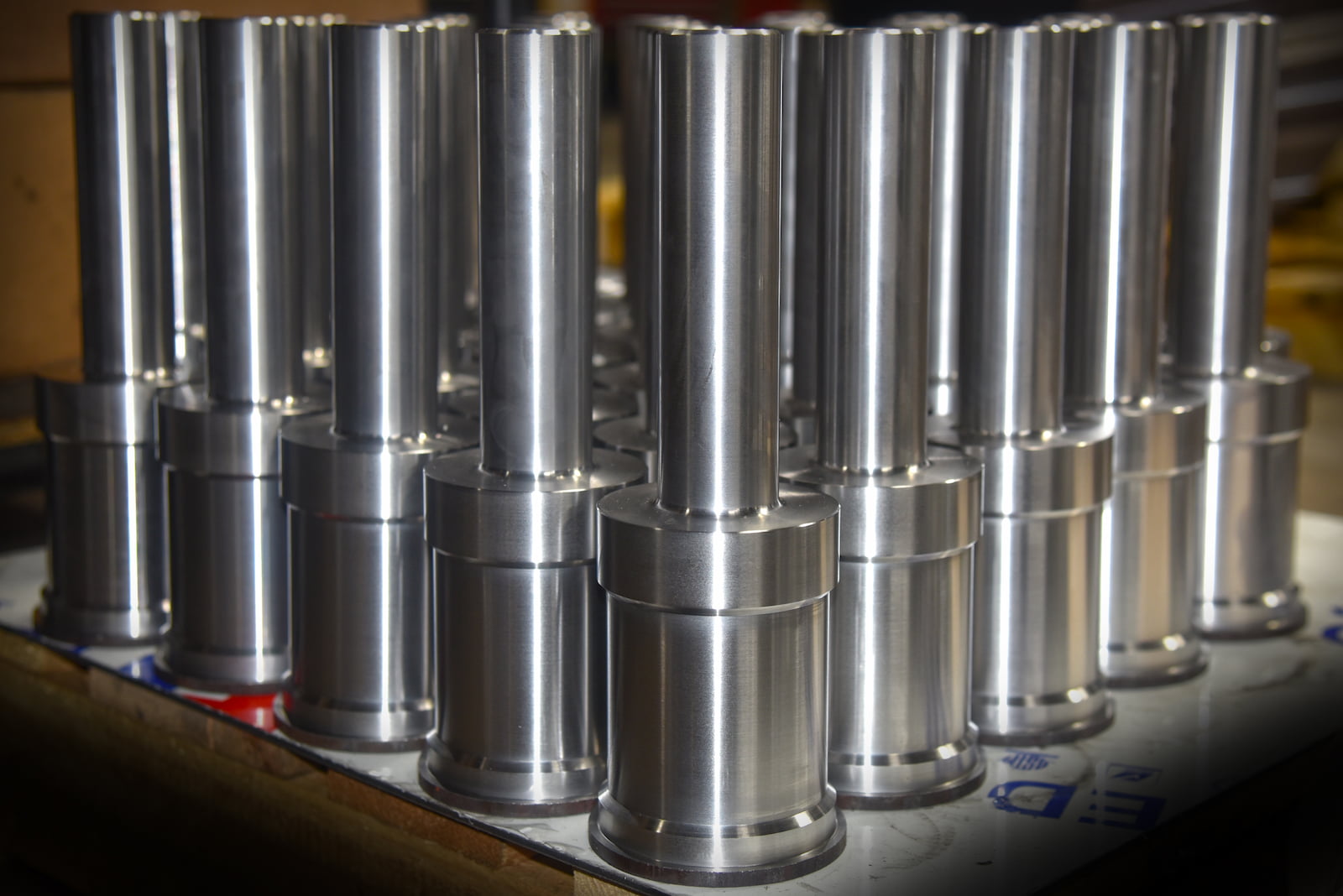 CNC-turned metal shafts produced for industrial applications at A to Z Machine in Appleton.