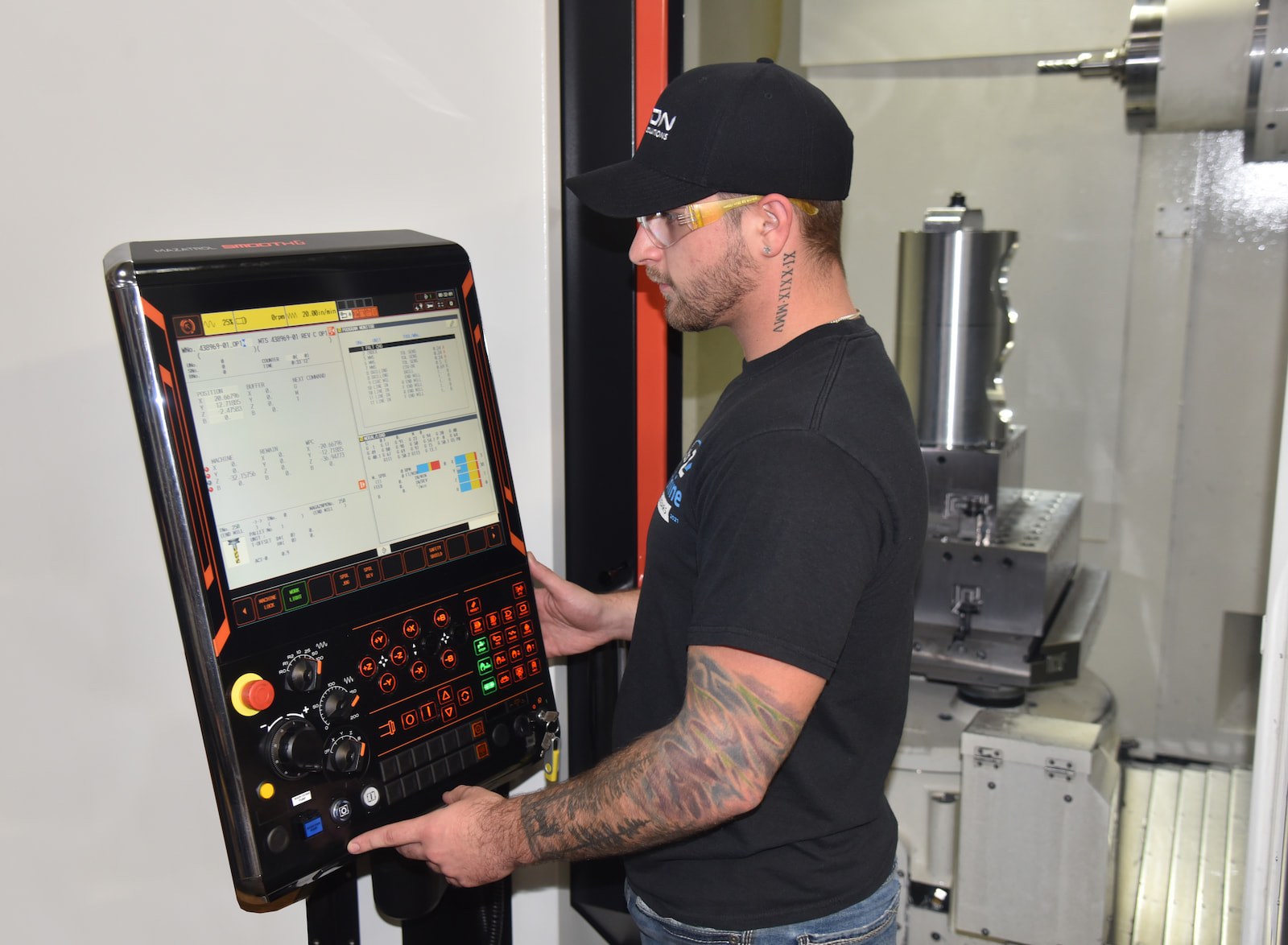 Precision-machined steel components in production at A to Z Machine CNC shop in Appleton.